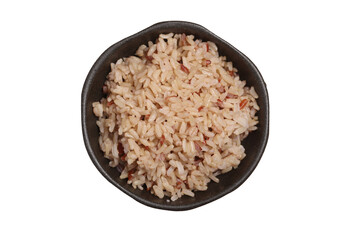 brown rice in a cup on a white background