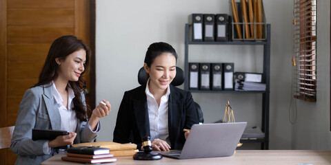 business people and lawyers discussing contract papers sitting at the table. Concepts of law, advice, legal services, legal and judgment concept