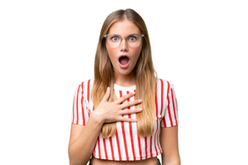 Young beautiful woman over isolated background surprised and shocked while looking right