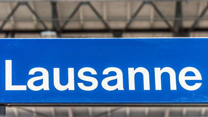 Close up of a railway station sign Lausanne