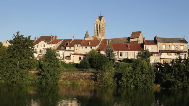 Townscape of Dormans, France. View of Marne river and catholic church. High quality 4k footage