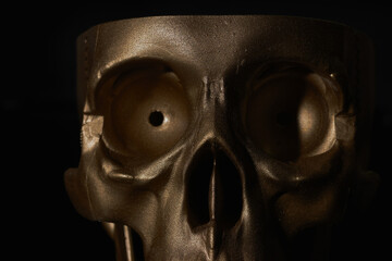 Gold human Skull Isolated on black background
