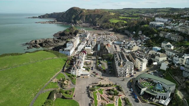 Rising aerial view of Ilfracobe Harbor on the North Devon coast, UK.