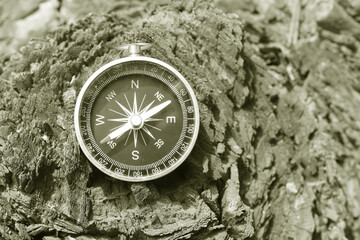 Fototapeta na wymiar round compass on natural background