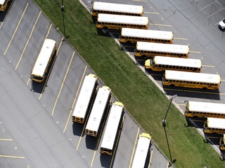 USA, Virginia, Leesburg, Aerial view of school buses in parking lot