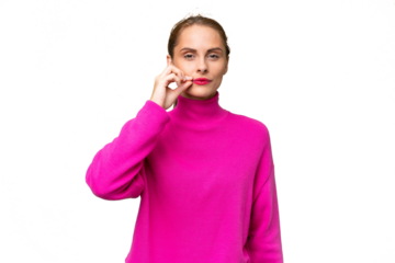 Young caucasian woman over isolated background showing a sign of silence gesture