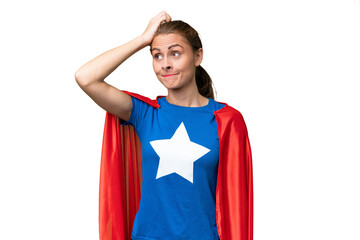 Young caucasian woman over isolated background in superhero costume and having doubts © luismolinero