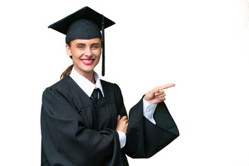 Young university graduate  caucasian woman over isolated background pointing finger to the side