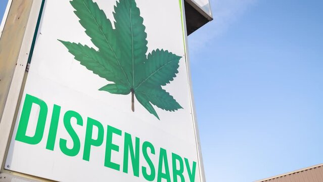 Cannabis dispensary sign, marijuana leaf, logo, legal marijuana, business. 4K 24FPS