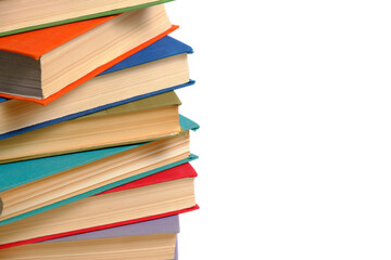 Bunch old battered multicolored hardcover books white background.