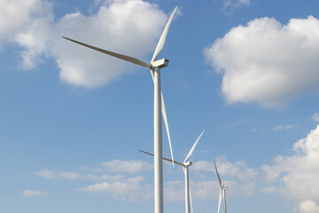 Fototapeta premium Wind turbine generate electricity with blue sky..