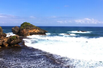 beach and blue sea with waves