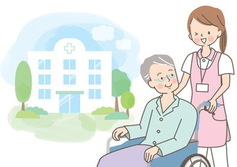 車椅子のシニア男性を介助する若い女性介護士