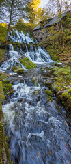 Waterfall in the small town of Röttle in southern Sweden outside of Gränna, along the highway E4 during a sunny autumn day. 