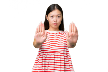 Young Asian woman over isolated background doing coming gesture