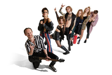 Group of stylish people, man and woman, rock music performers posing over white background....