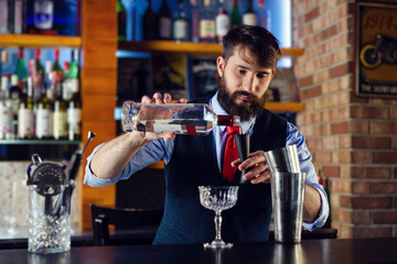 Bartender guy working prepare cocktail skills