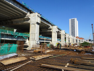 
JOHOR, MALAYSIA -JUNE 17, 2022: The construction site is in progress. Construction work is being carried out in stages. Construction workers are carrying out work under strict safety supervision.