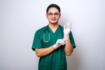 Professional and confident smiling asian physician, nurse wear rubber gloves and stethoscope for patient examination