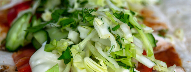 sliced cabbage close-up. cabbage salad. source of vitamins. Horizontal image.