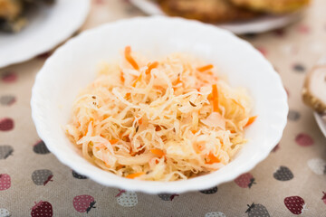 appetizing fermented cabbage in bowl plate