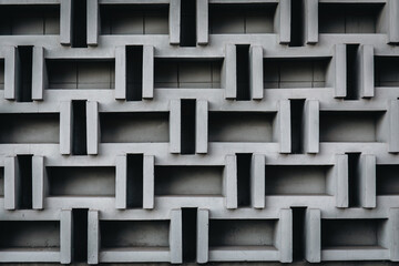 Abstract geometric background of the concrete, part of a modernist building.