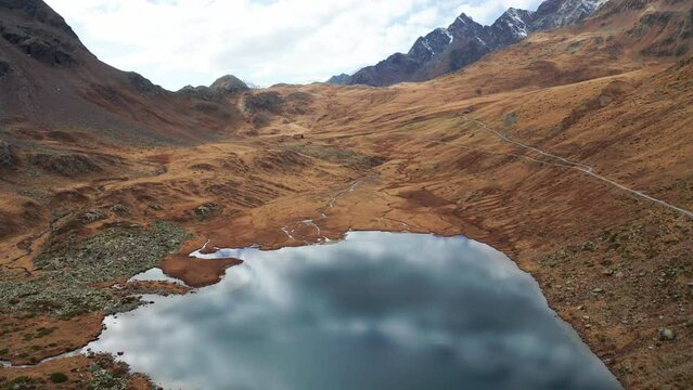 Val Viola in Valtellina, Italy, aerial view of the refuge and the small lake