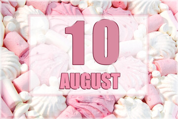 calendar date on the background of white and pink marshmallows. August 10 is the tenth day of the month