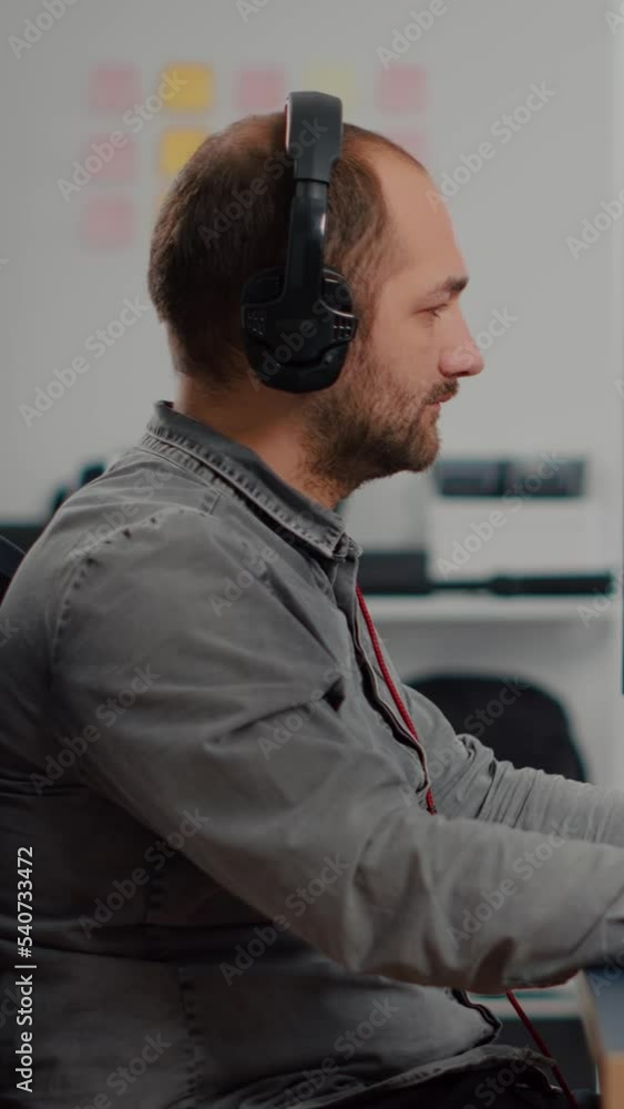 Poster focused man designer architect working at new project using computer with graphic software and stylu
