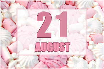 calendar date on the background of white and pink marshmallows. August 21 is the twenty first day of the month
