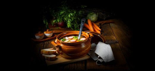 Potato kohlrabi soup with bockwurst