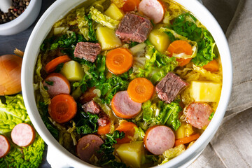 delicious savoy cabbage soup in white vase