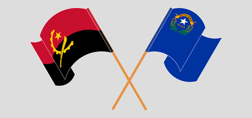 Crossed and waving flags of Angola and The State of Nevada
