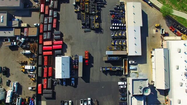 Aerial: Aerial Top Shot Of Containers And Equipment At Port In City, Drone Flying Forward On Sunny Day - Long Beach, California