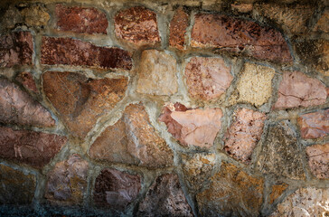 Abstract texture background from the stones of the old wall