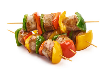 Kebab - grilled pork sausage skewers and vegetables BBQ, close-up, isolated on white background.