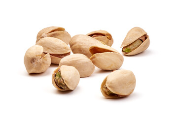 Heap of pistachios isolated on white background.