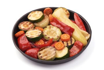 Grilled vegetables ( colorful bell pepper, zucchini, eggplant, onion ) on black Cast iron pan.