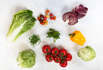 Organic vegan food. Vegetables on stone background with copy space.