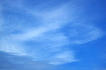 Beautiful White Clouds Spreading Across Vibrant Blue Sky