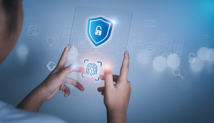 Woman holding phone tablet screen with protection icon. Represents protection against external hacks. Security concepts against code, virus, firmware and malware.