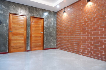 brick wall from bricks showing a semi-modern feel Made to show the surface especially without plastering over it. The brick show has many forms. Both the bricks show smooth, the bricks are thick.