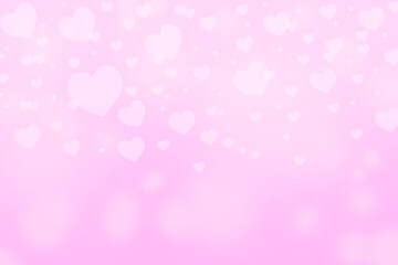 Heart bokeh light effect and glitter on pink background. With copy space. Valentine’s Day concept.