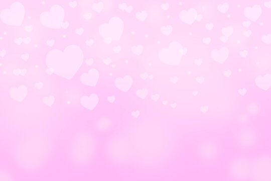 Heart bokeh light effect and glitter on pink background. With copy space. Valentine&rsquo;s Day concept.