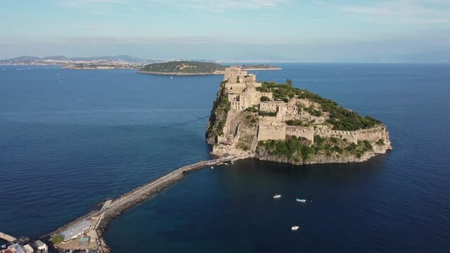 Ischia, Italy: Aerial drone footage with the famous Aragonese castle in the Ischia island near Naples in Italy. Shot with a rotation motion. 