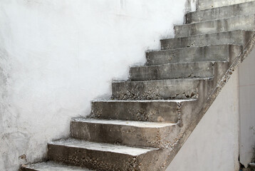 The old concrete stairs on the concrete wall