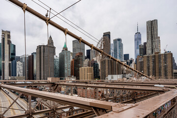 Lower Manhattan seen from the Brooklyn Bridge, New York City, with ropes in foreground