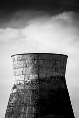 Decaying disused industrial chimney.Concept of environmental sustainability and ecological transition - 540757220