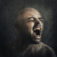 portrait of a man with face screaming