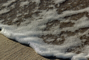 texture of the sand and water